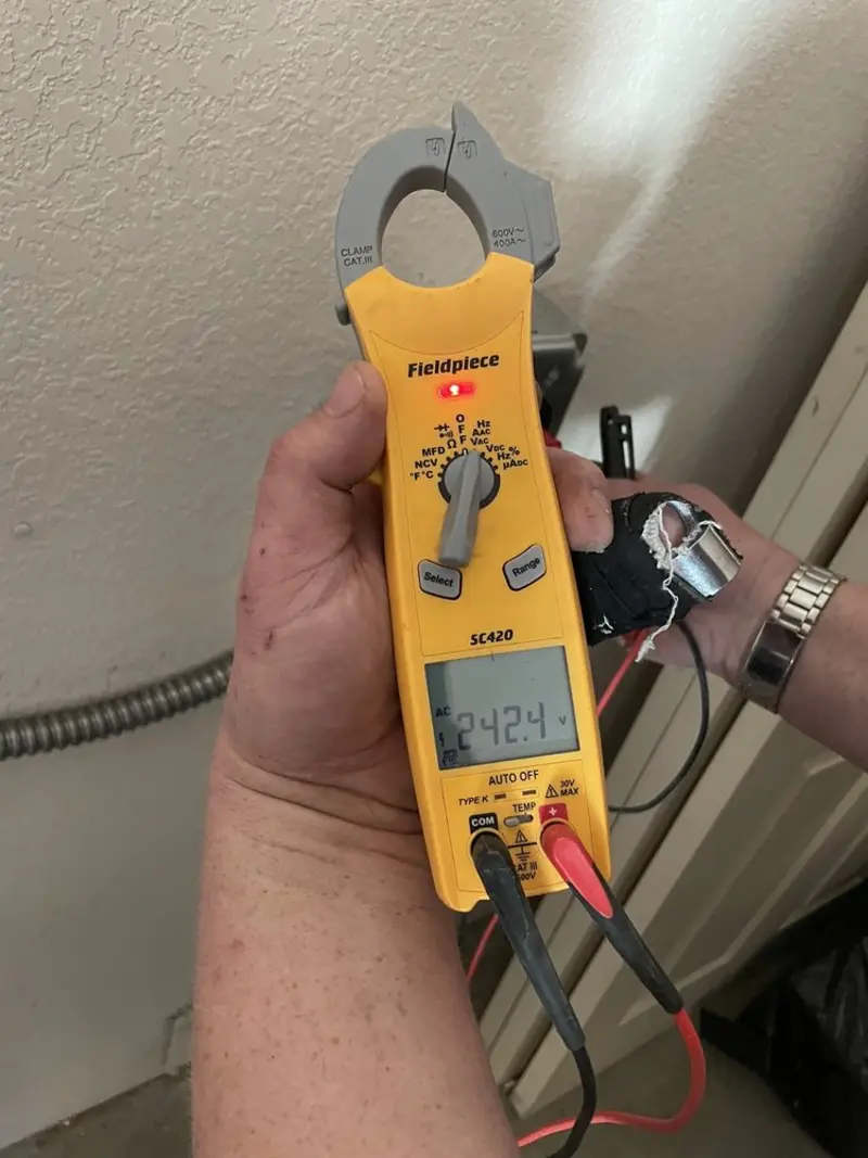 Voltage testing with clamp meter during Aluminum Wiring Replacement in Huxley